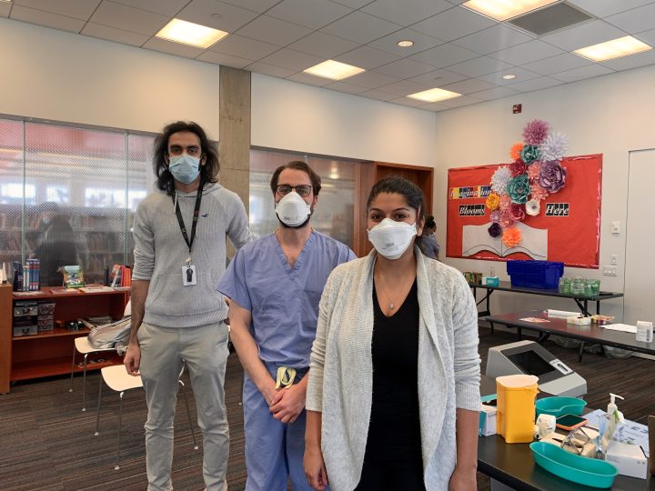 Site head Parsa Kamali, left to right, Dr. Allen Greenwood and Dr. Alia Dharamsi are some of the staff operating the Maria A. Shchuka Library "Vax And Read" pop-up clinic. As part of a new COVID-19 vaccination initiative, Toronto Public Health and Team Toronto partners are targeting neighbourhoods experiencing barriers to vaccination and low vaccine uptake in Toronto.