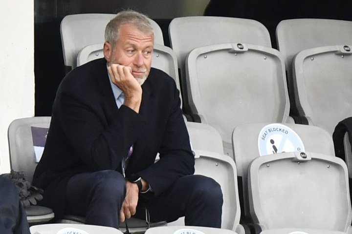 Russian oligarch Roman Abramovich banned from running Chelsea FC