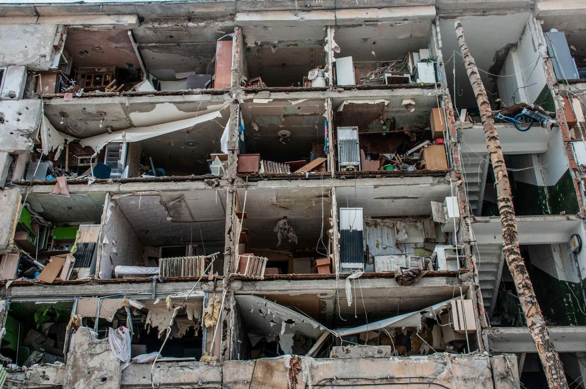 A view of destroyed apartments damaged by shelling, in Kharkiv, Ukraine, Sunday, March 13, 2022.