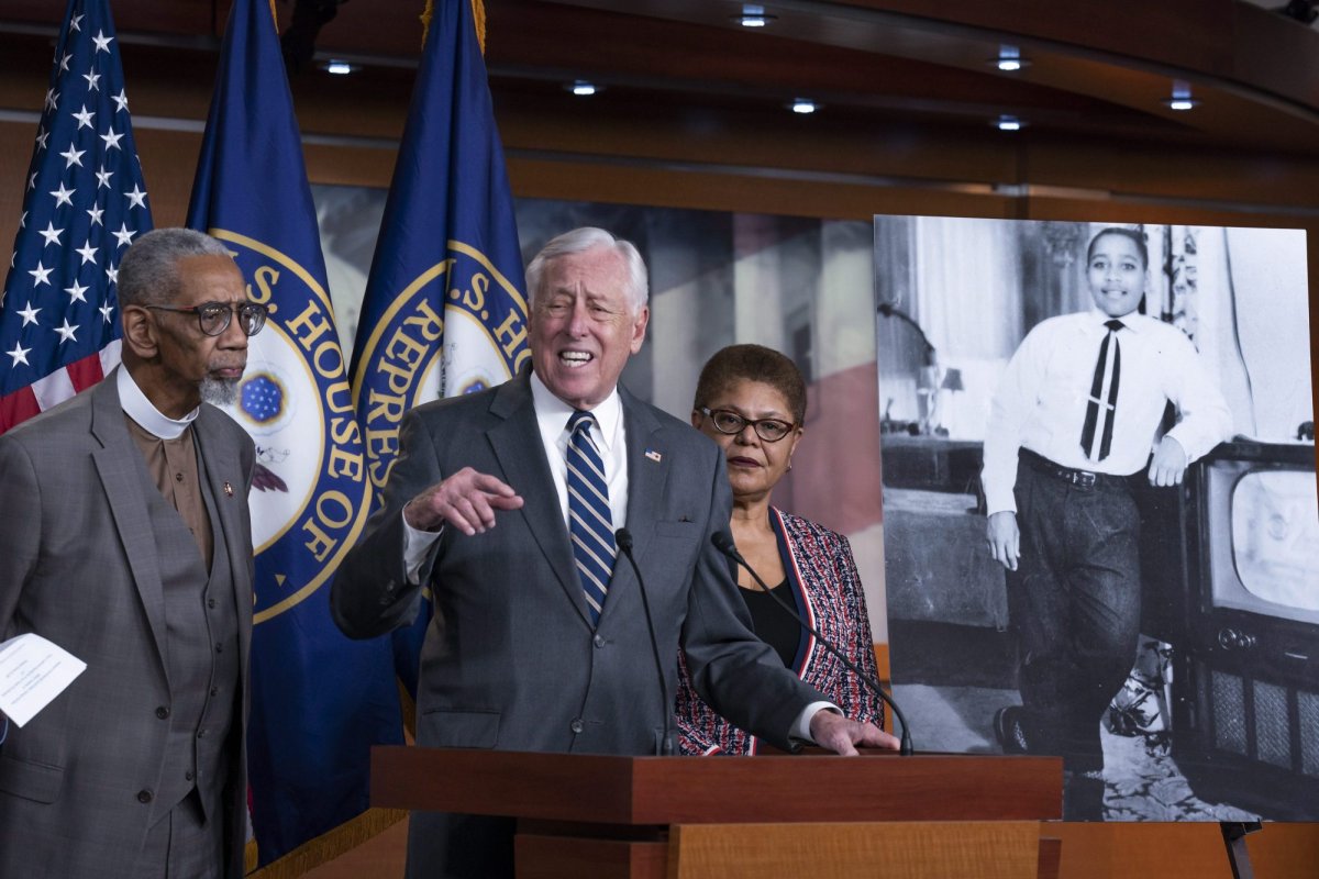 House Majority Leader Steny Hoyer, D-Md., center, is flanked by Rep. Bobby Rush, D-Ill., left, and Rep. Karen Bass, D-Calif., chair of the Congressional Black Caucus, during a news conference to discuss the "Emmett Till Antilynching Act" which would designate lynching as a hate crime under federal law, on Capitol Hill in Washington, Wednesday, Feb. 26, 2020. Emmett Till, pictured at right, was a 14-year-old African-American who was lynched in Mississippi in 1955, after being accused of offending a white woman in her family's grocery store. (AP Photo/J. Scott Applewhite).