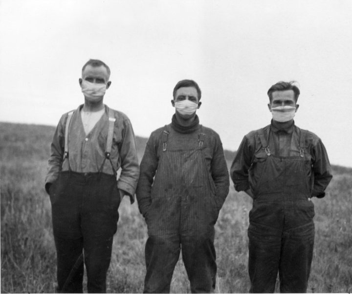 Men wear masks in Alberta during the Spanish flu pandemic of 1918.