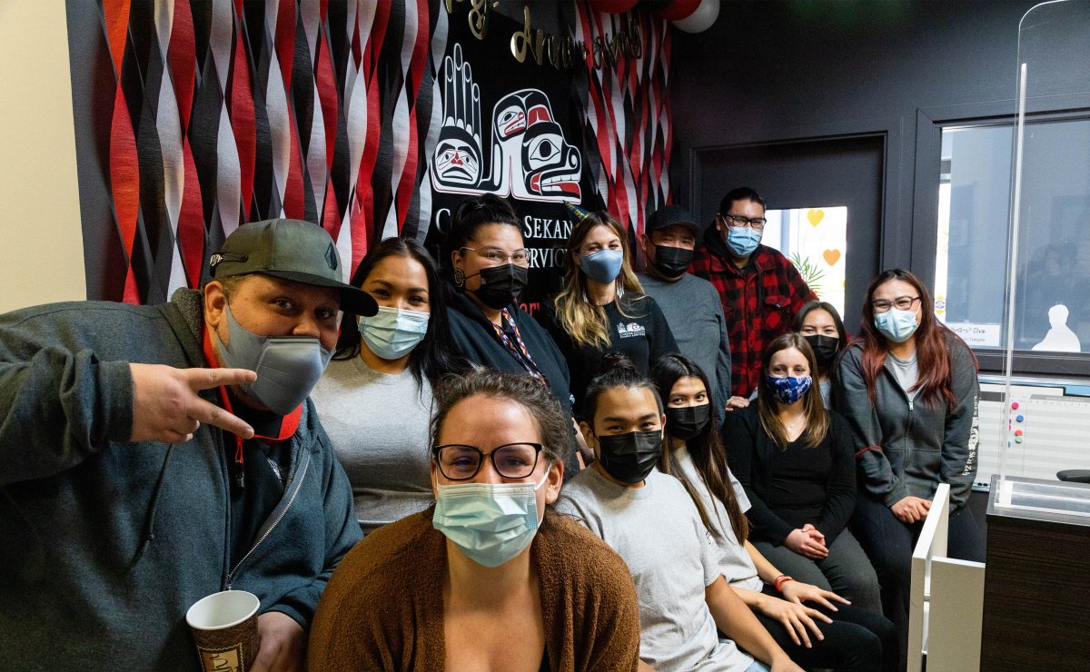 Staff at the Carrier Sekani Family Service's Sk’ai Zeh Yah Youth Centre in Prince George, B.C. pose for a quick photo during the COVID-19 pandemic.