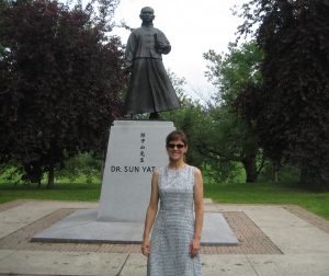 Dr. Alison Marshall stands in front of the Sun Yatsen Monument in Toronto’s Riverdale Park close to East Chinatown .