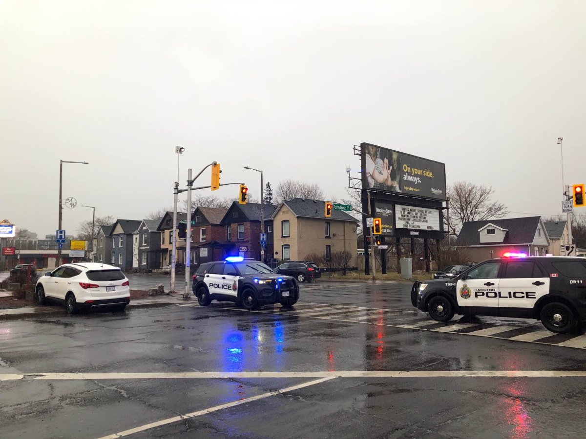 Police cars at the intersection of Main and Dundurn in Hamilton