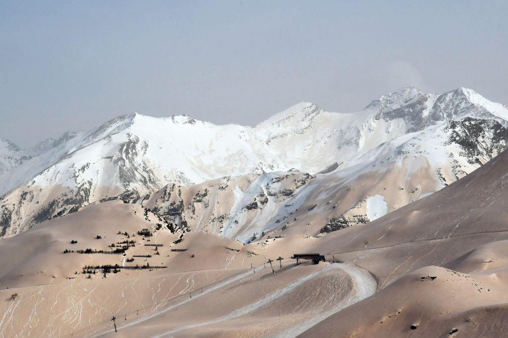 Sand from the Sahara blankets a snowy mountain at a ski resort in France