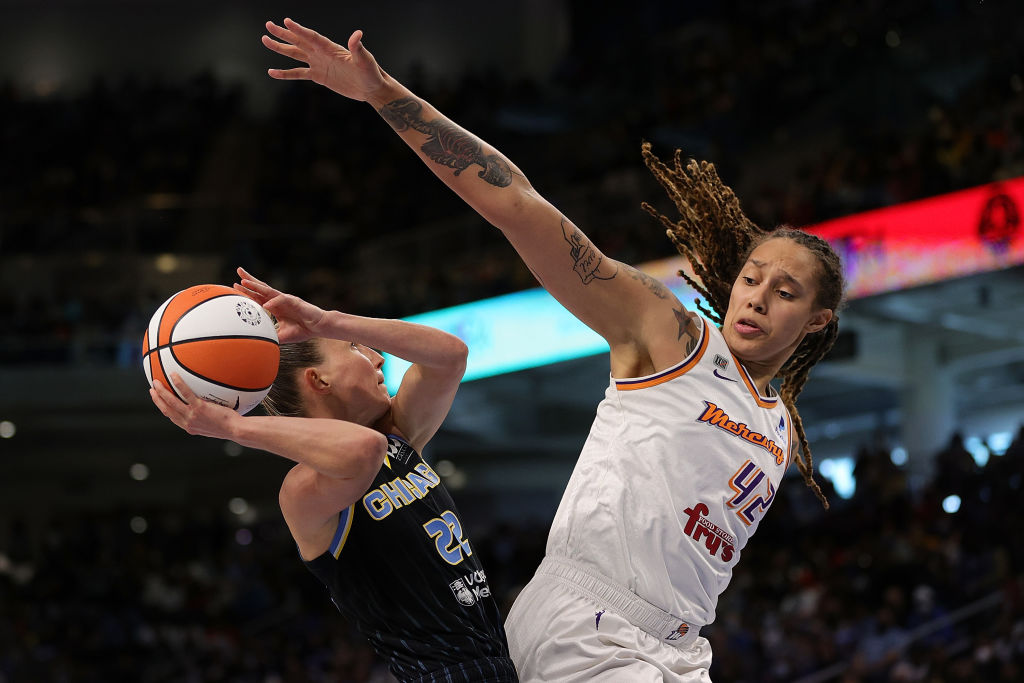 Brittney Griner goes up against an opponent in a WNBA game.