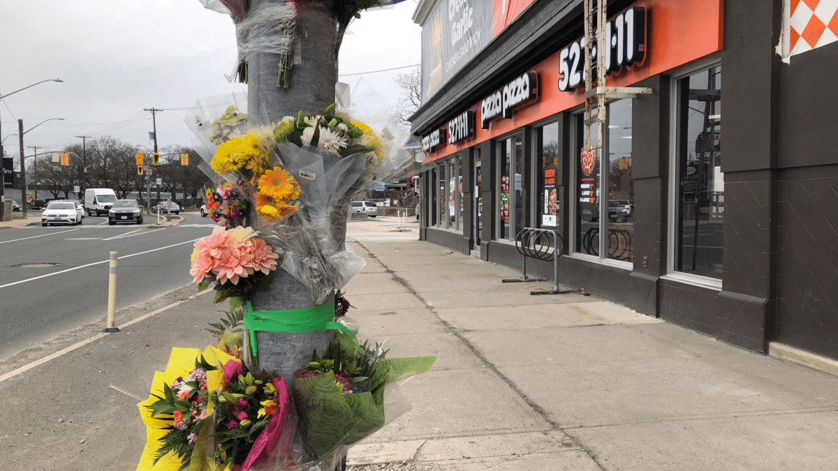 A memorial at the intersection of King Street East and Main Street East in Hamilton. Four people from the GTA have been identified as the deceased following a fatal crash on March 19, 2022.
