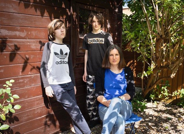 William and James, 13,  pictured here with their mother