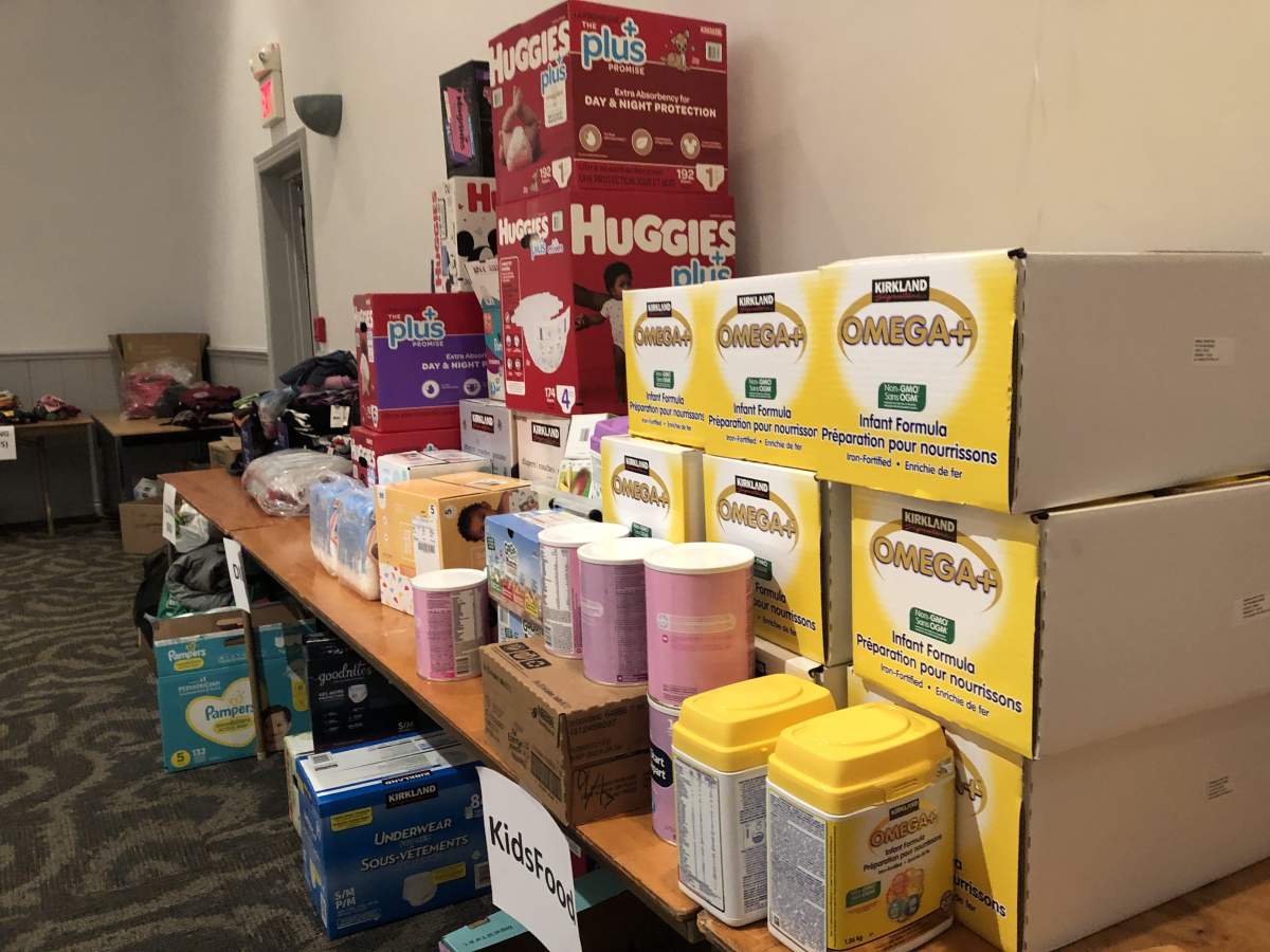 Table full of donations at the London Ukrainian Centreto support Ukraine following Russia’s invasion. Mar. 1, 2022