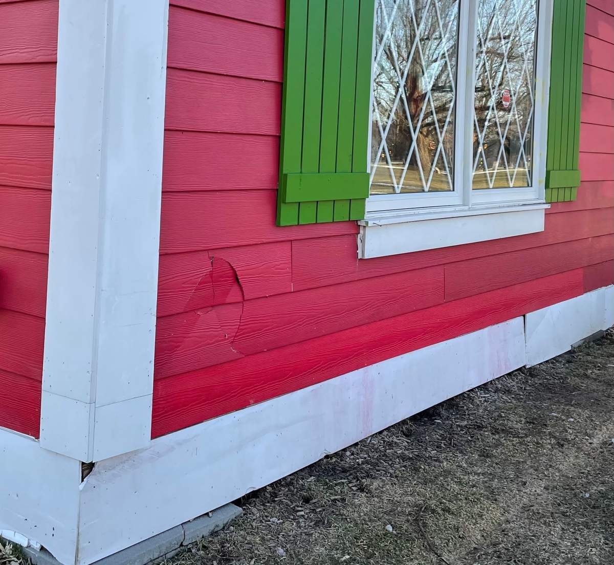 Damage on the side of Santa’s House in Victoria Park on March 29, 2022.