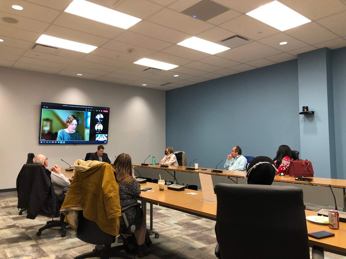 Board of Health chair Matt Reid sits at the head of the table ahead of a confidential meeting held at the Middlesex-London Health Unit's Citi Plaza office on March 3.