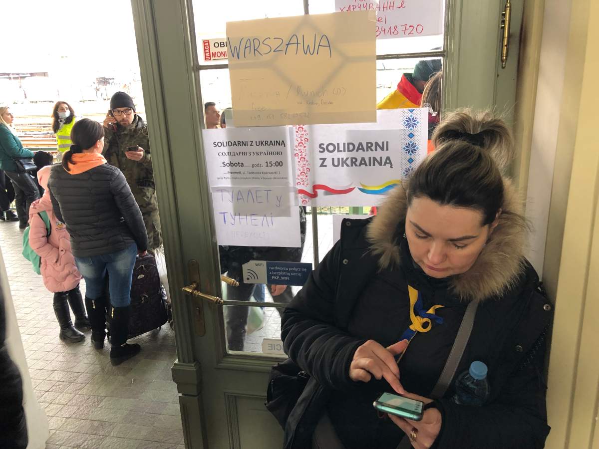 A sign on the window of the Przemysl train station reads Solidarity with Ukraine.