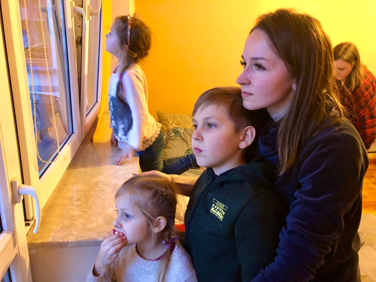 Ukrainian refugee Natalia Bihlenko in Rzeszow, Poland with her son Platon and daughter Maria.