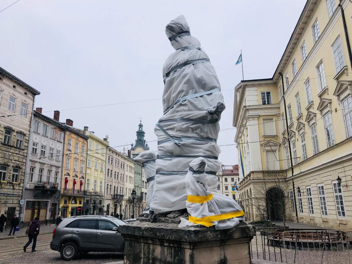 Statue wrapped in plastic to protect it from Russian forces, Lviv, Ukraine, March 7, 2022.