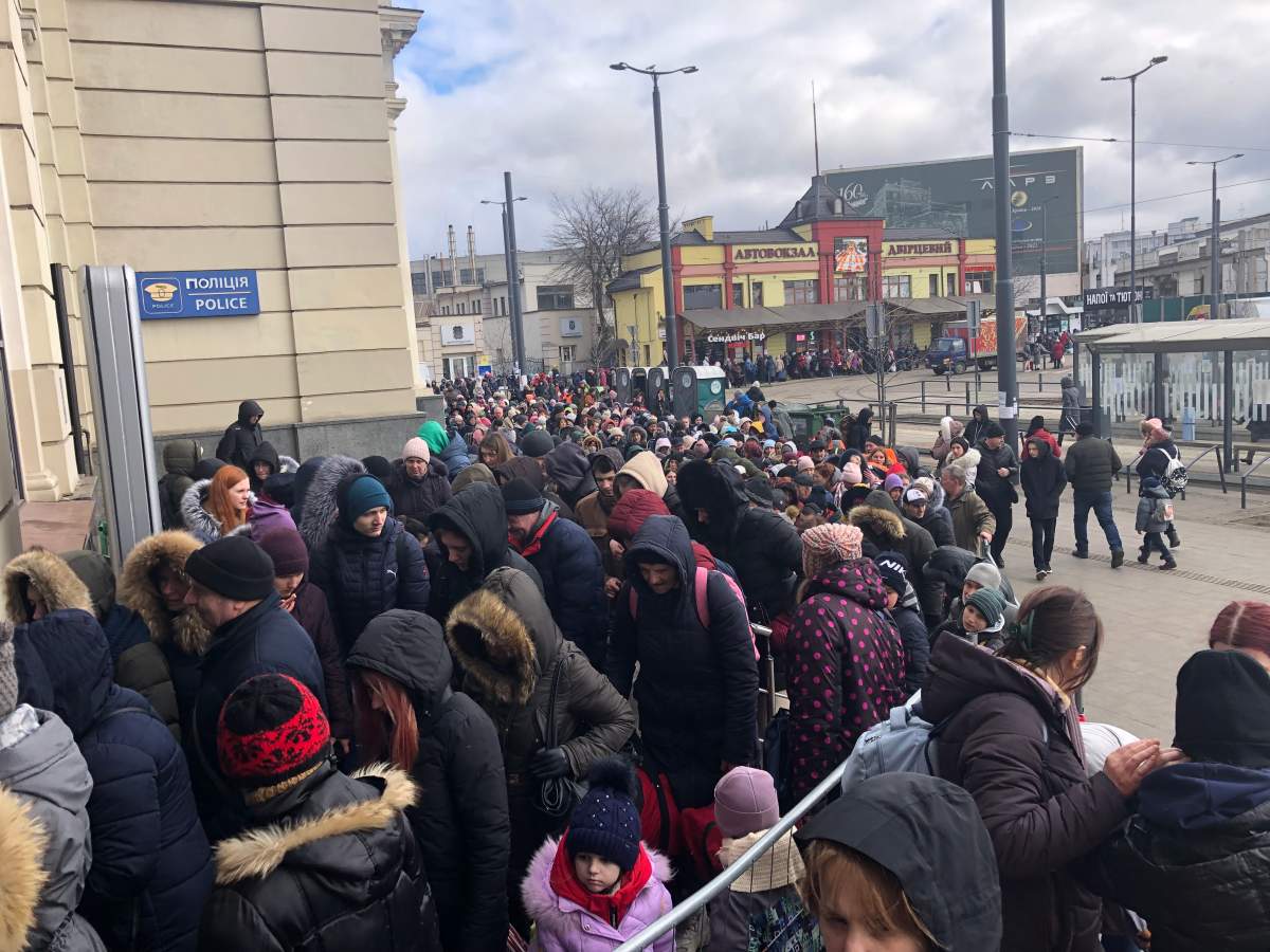 Passengers trying to board trains out of Ukraine line up at Lviv Railroad Station, March 8, 2022