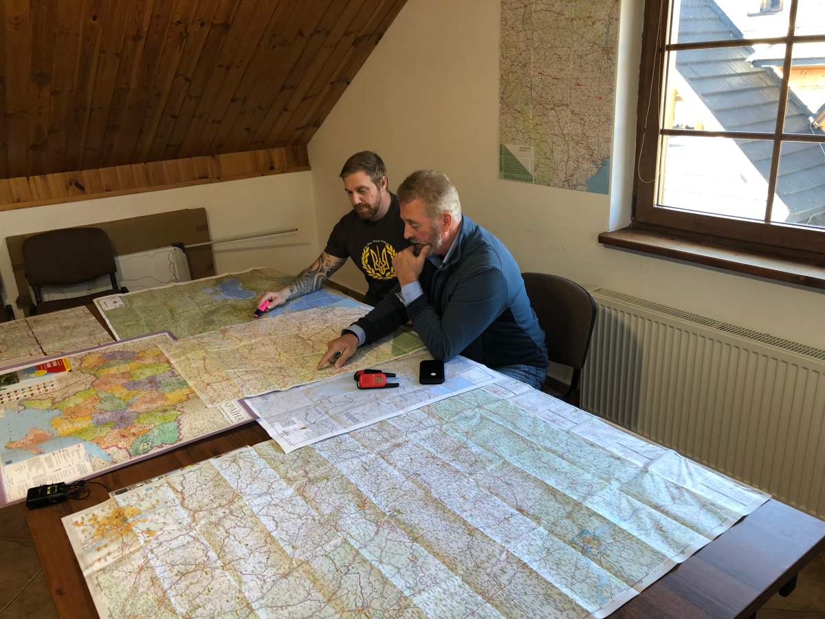 Canadian military veterans Kynan Walper, left, and Dave Lavery, in the operations room of their new base in Ustrzyki-Dolne, Poland, March 23, 2022.