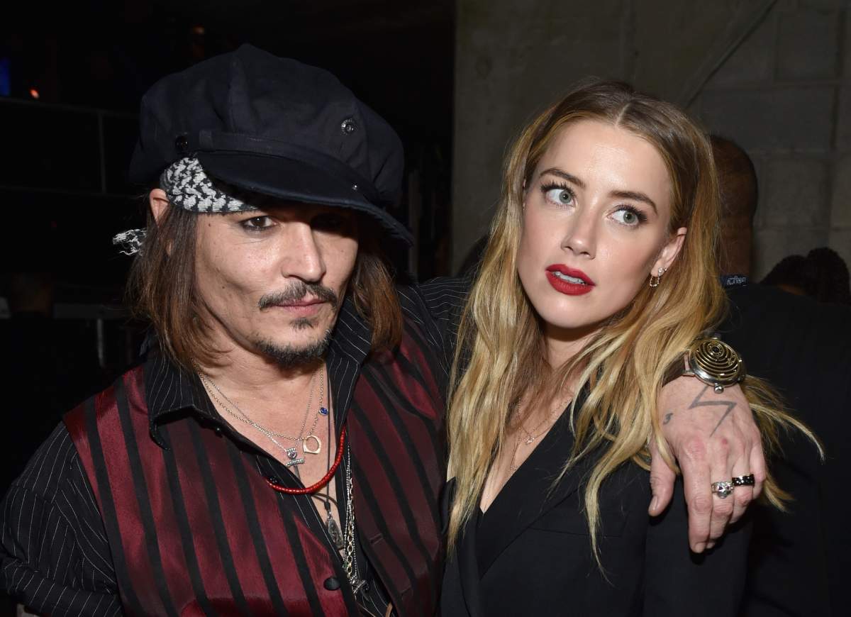 Johnny Depp and Amber Heard at The 58th GRAMMY Awards