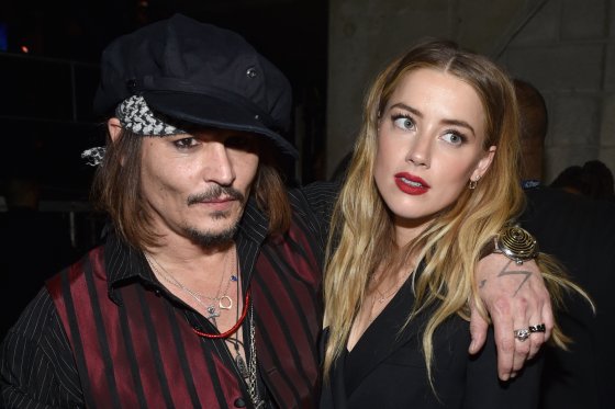 Johnny Depp and Amber Heard at The 58th GRAMMY Awards