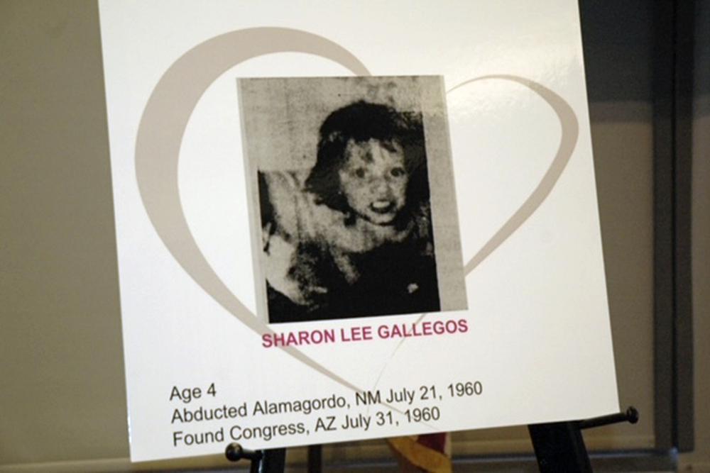 A family photo of Sharon Lee Gallegos is displayed by the Yavapai County Sheriff's Office during a news conference in Prescott, Ariz., Tuesday, March 15, 2022. The Yavapai County Sheriff's office said the previously unidentified little girl dubbed "Little Miss Nobody," whose burned remains were found more than 60 years earlier in the Arizona desert was 4-year-old Sharon Lee Gallegos, of New Mexico. The child's remains were found on July 31, 1960, partially buried in a wash in Congress, Arizona.