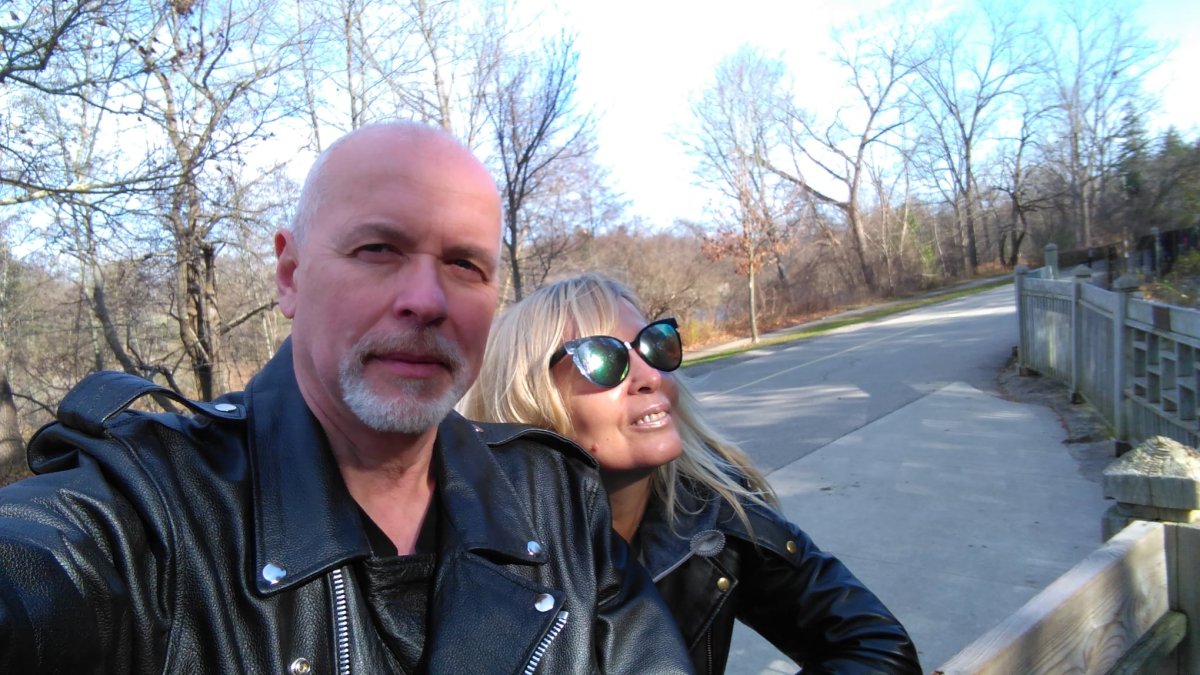Volodymyr Tretyak and his wife snap a selfie in London, Ont.'s Springbank Park in September 2021, prior to their move back to Ukraine.