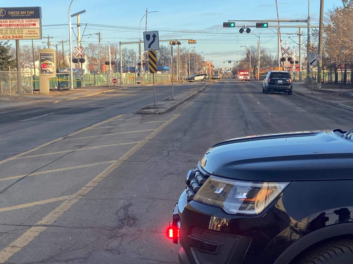 Edmonton police on scene of an incident at the 95 Street LRT crossing north of 105 Avenue Friday, March 25, 2022.