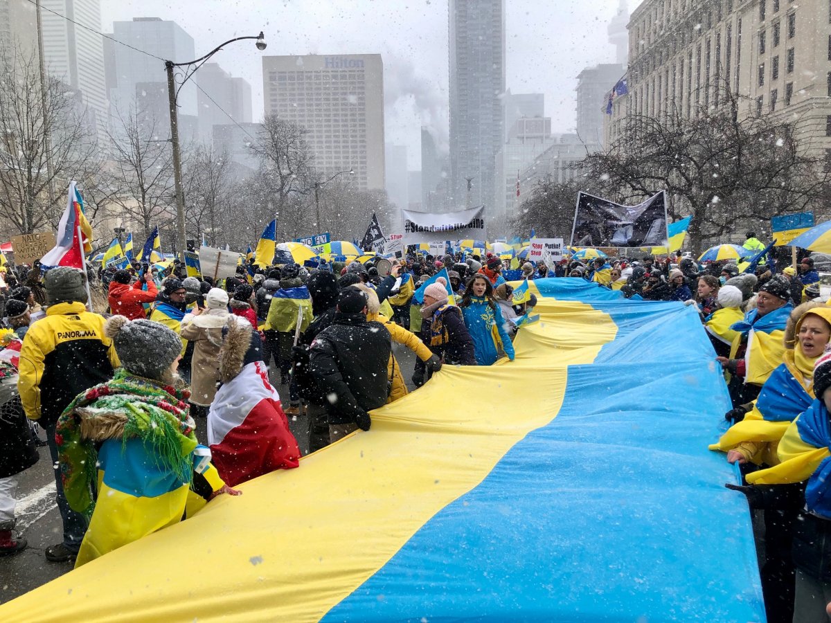 Demonstrators marched in Toronto on Sunday to show solidarity with Ukraine.