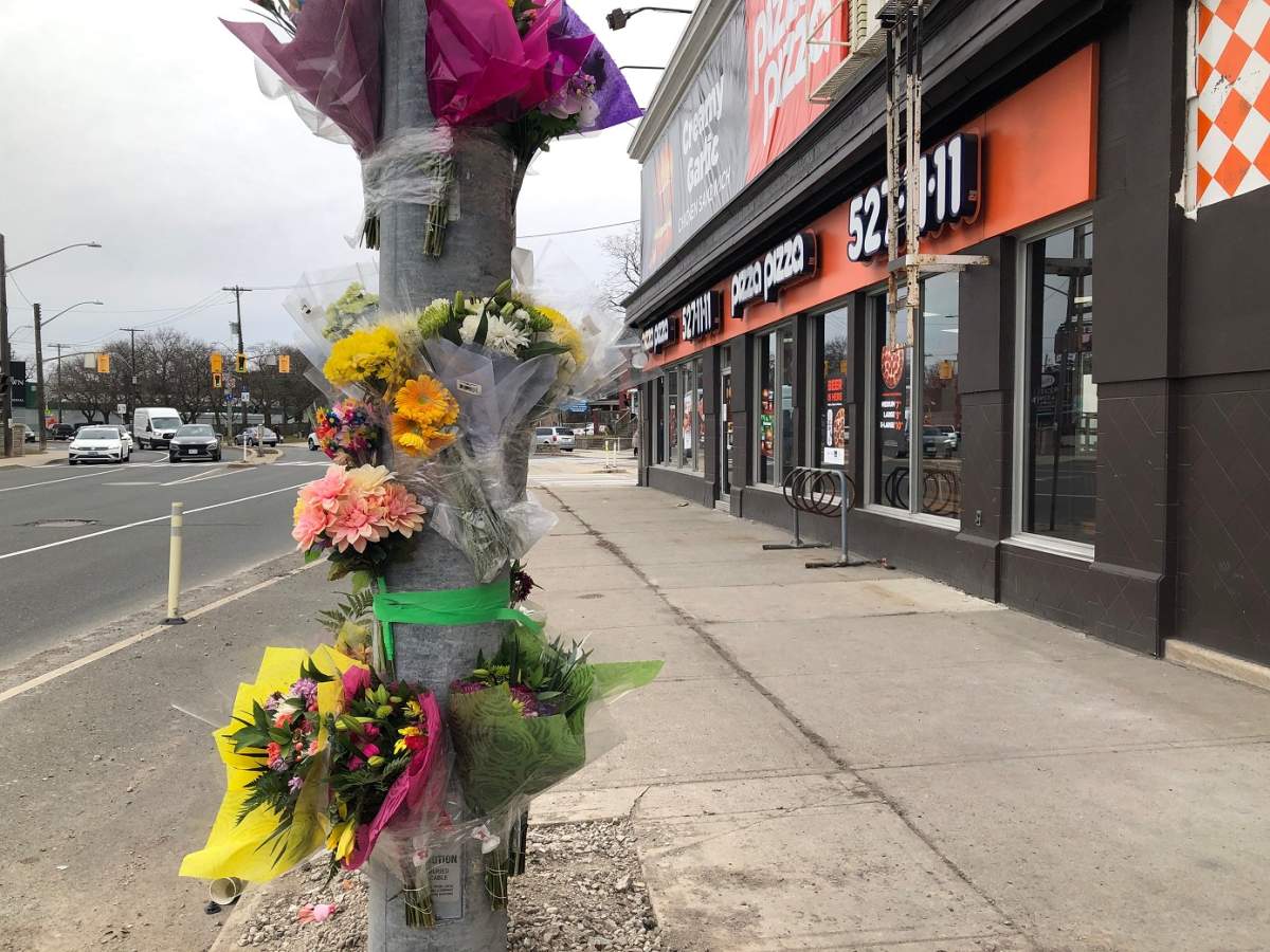 The crash at the intersection of King and Main Streets killed four people, including two maintenance workers contracted by Pizza Pizza.