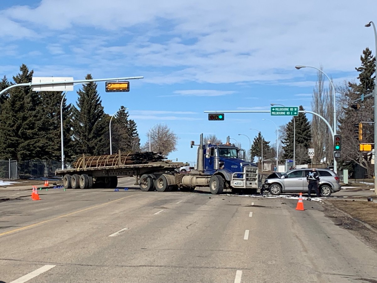 A head-on collision between a semi and an SUV at the intersection of Millbourne Road East and 76 Street in Mill Woods on Monday, March 21, 2022.