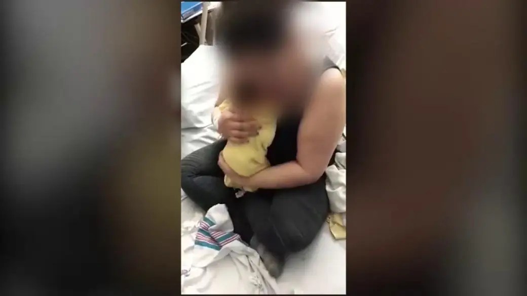 Two social media videos show a newborn baby girl being taken from the arms of her Indigenous mother by Manitoba social workers and police in 2019.