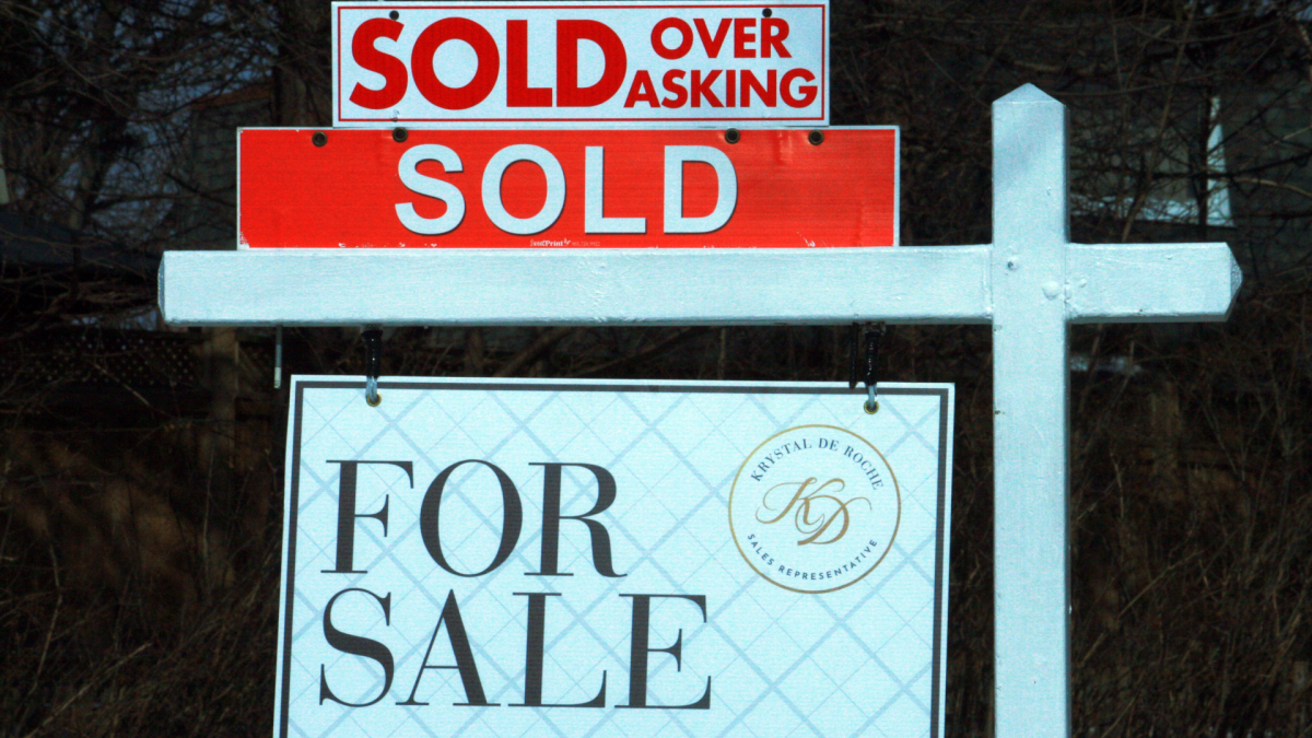 A real estate sign is shown in Halton Region, Sunday, Feb.13, 2021.