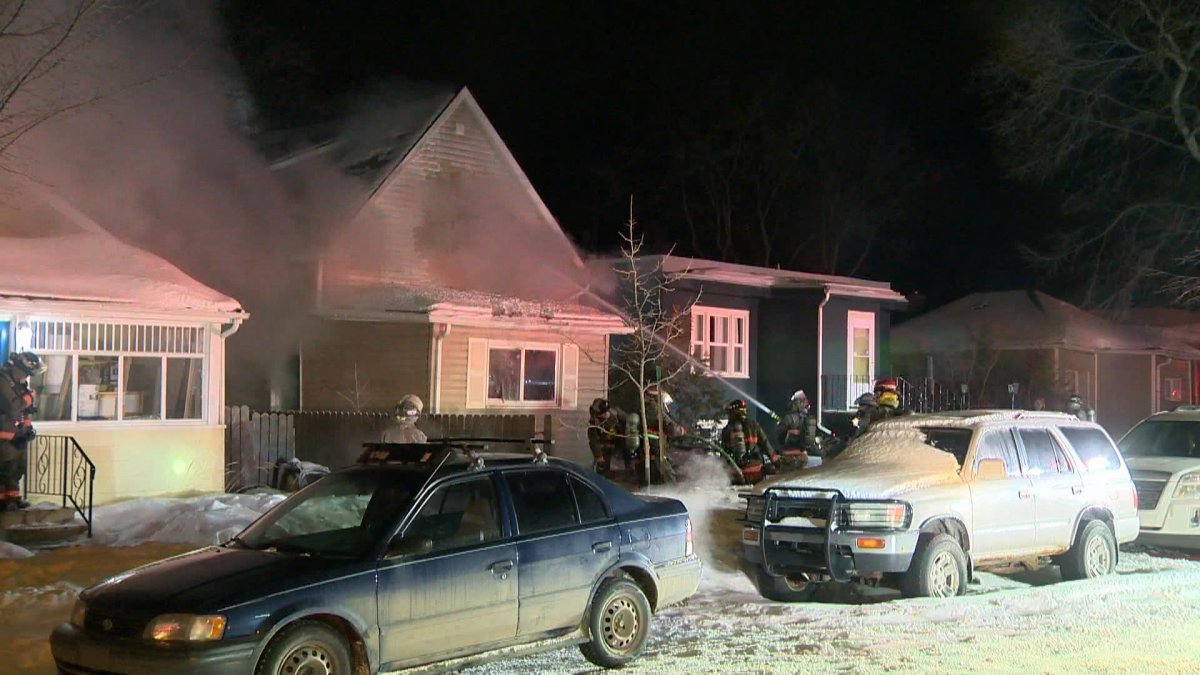 Smoke and flames were coming from the one-and-a-half storey home on Avenue I North when Saskatoon firefighters arrived.
