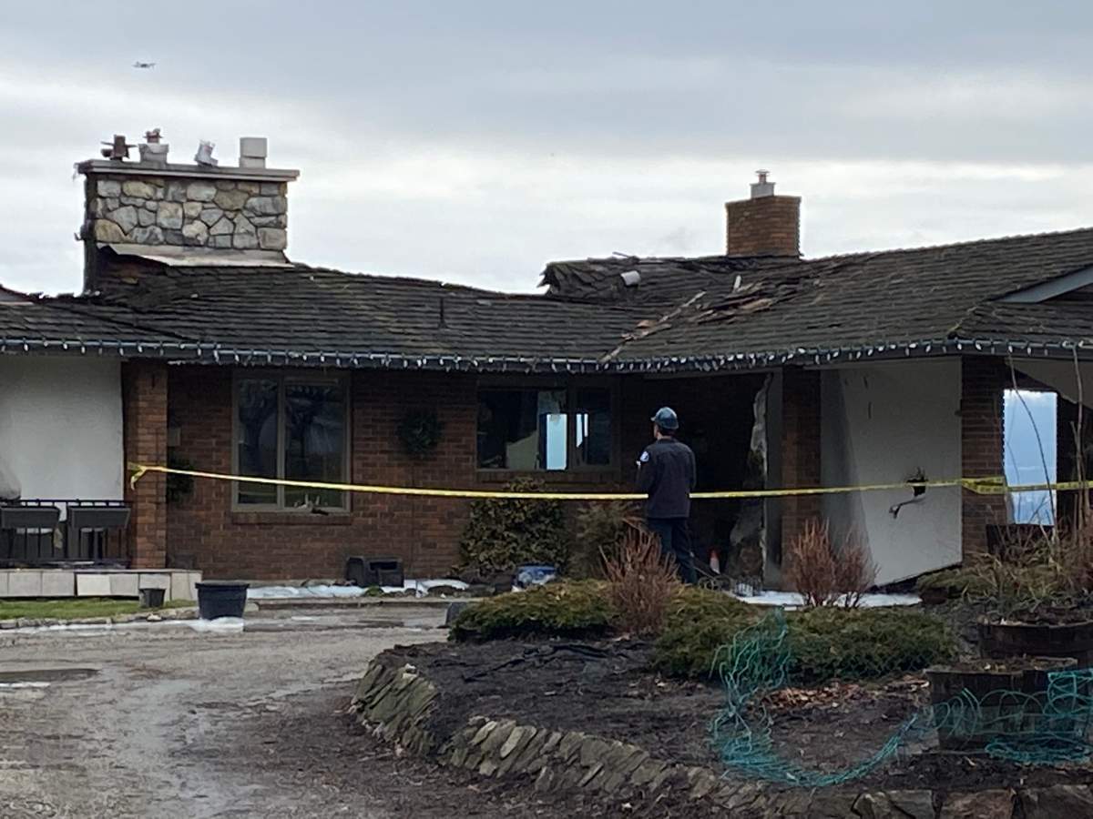 The fire-damaged house on Tuesday morning.