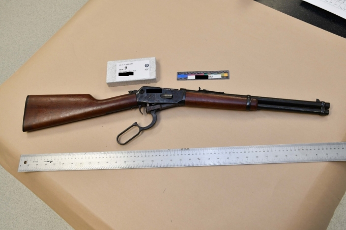 SIU seized a rifle from the scene where an OPP officer was confronted by a man with a firearm.