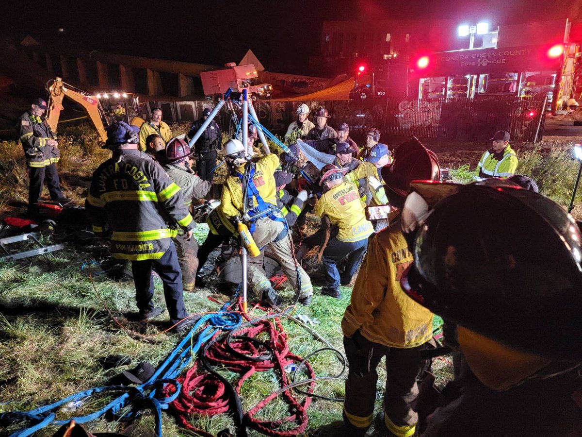 Rescue crews working to extract a man who got stuck in a storm drain in Antioch, California.