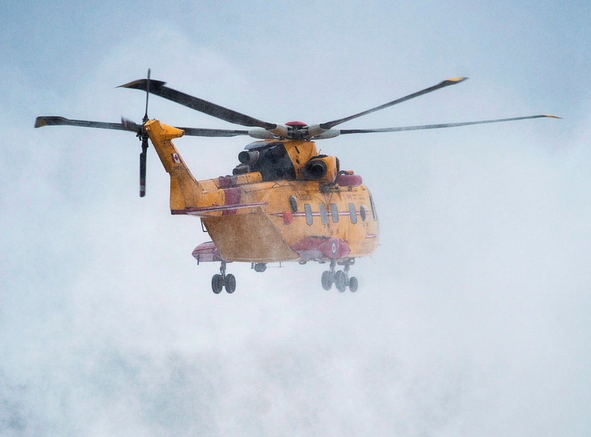 A Cormorant search and rescue helicopter is seen in flight.