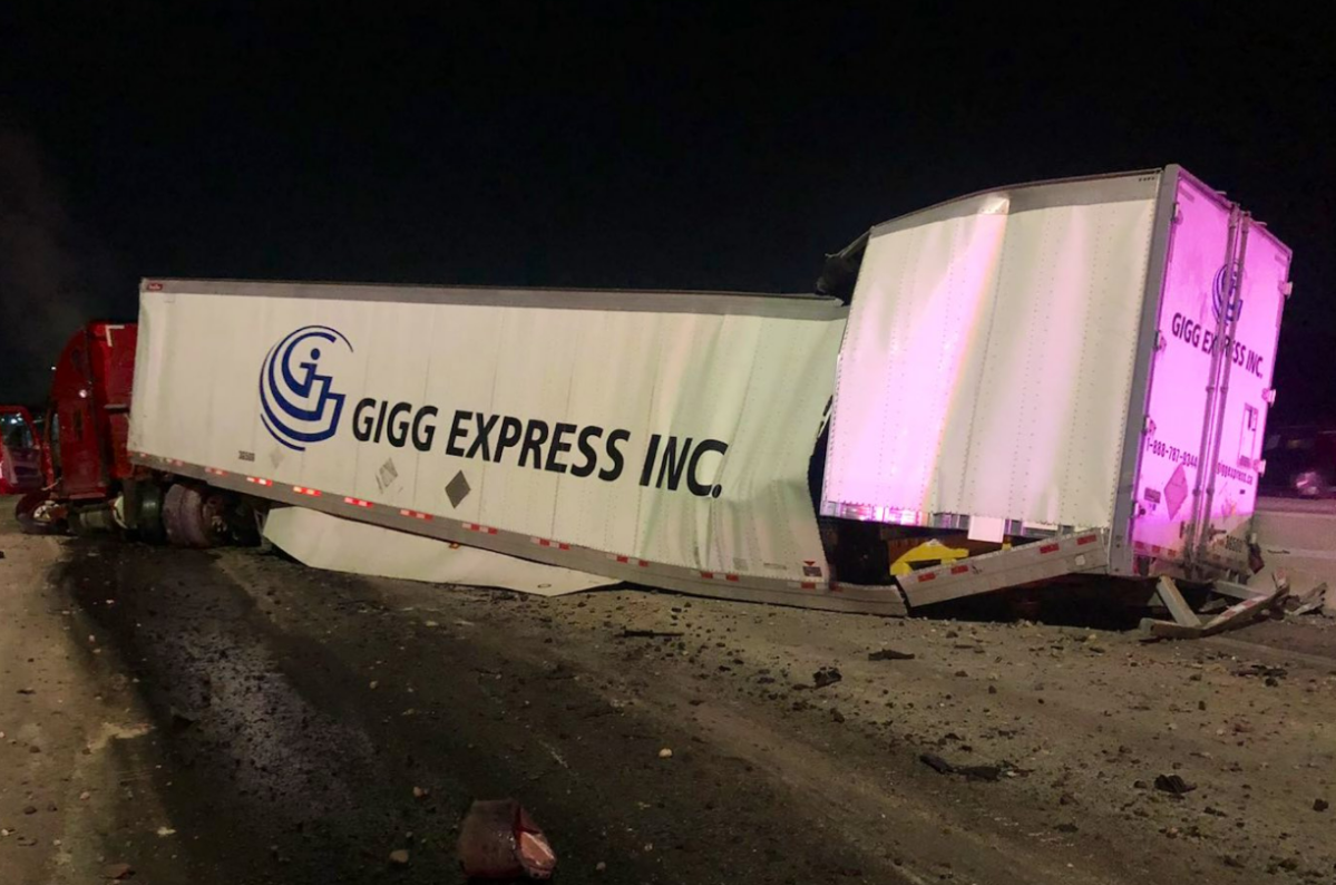 The driver of a transport truck has been charged with careless driving after a collision on Highway 401. 