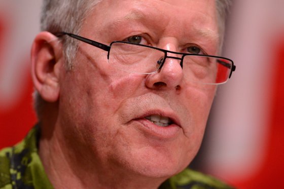 Gen. Jonathan Vance wears a green uniform and glasses in a close up shot.