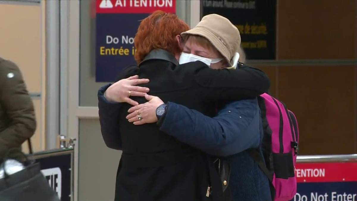 Olga Renneberg huge her mother, Liudmyla Volovyk, as the pair were reunited at the Edmonton International Airport Monday, March 7, 2022.
