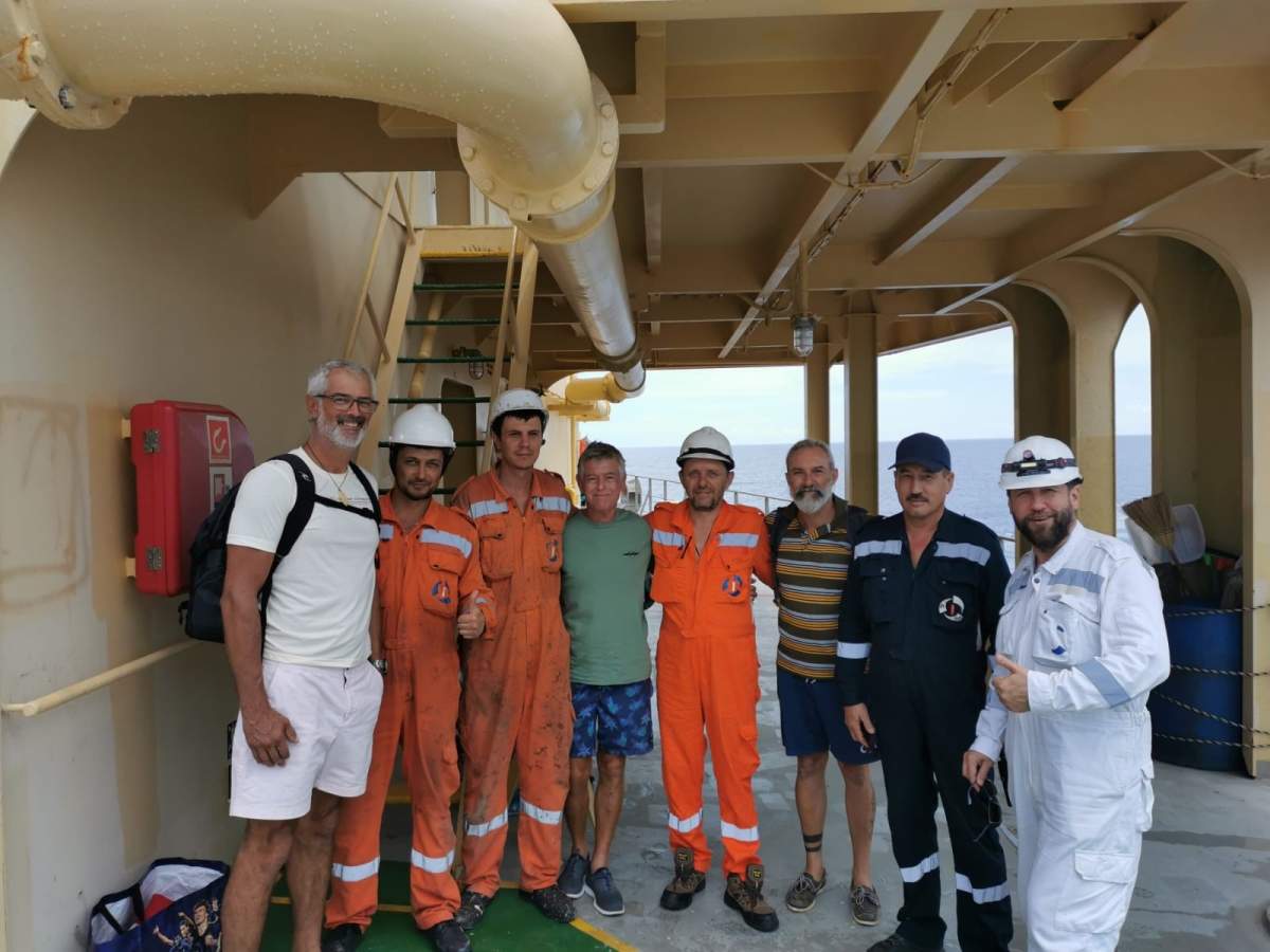 Venter pictured with the Ukrainian and Russian crew of the Some of the crew on tanker, Petalouda.