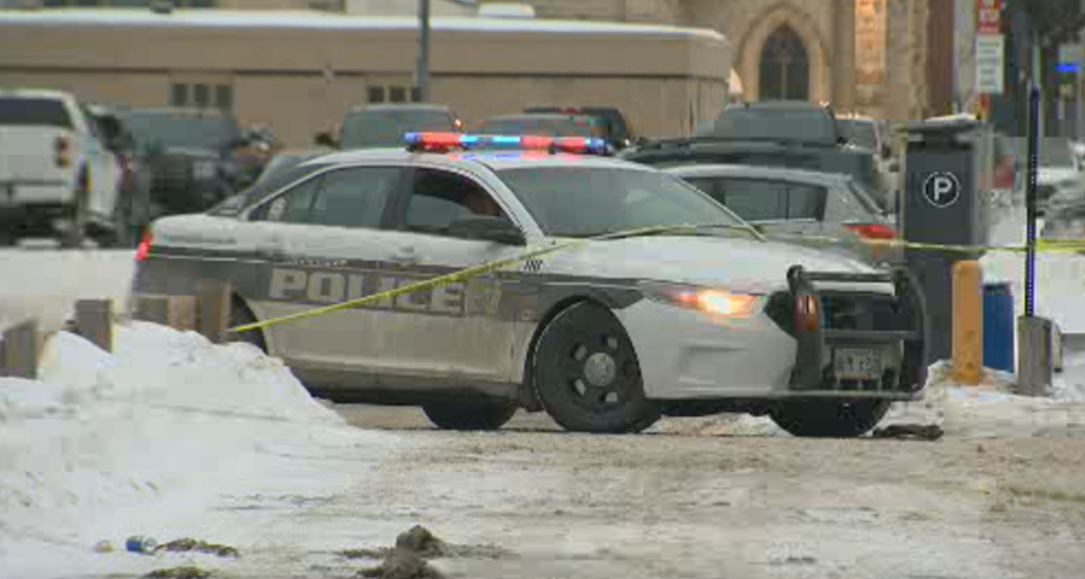 Police investigate a downtown shooting Feb. 9.