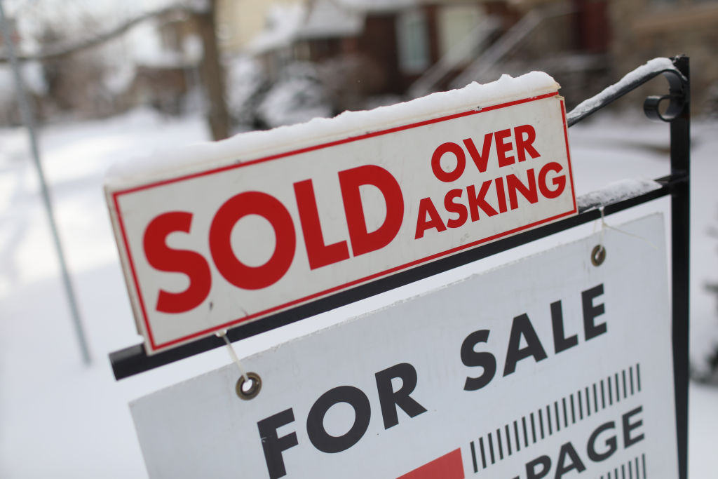 sold over asking sign