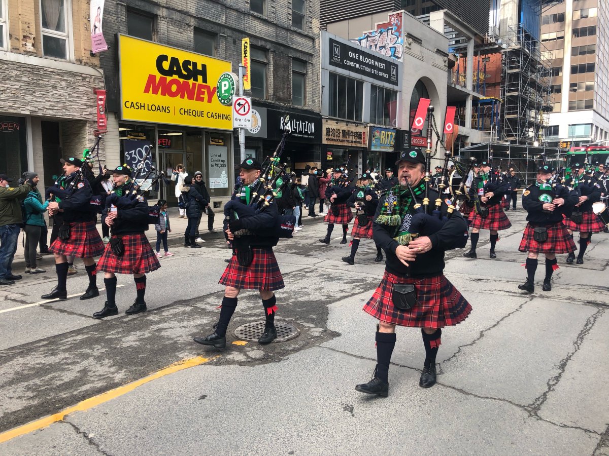 Members of the public enjoy the St. Patrick's Day parade in downtown Toronto on March 20, 2022.