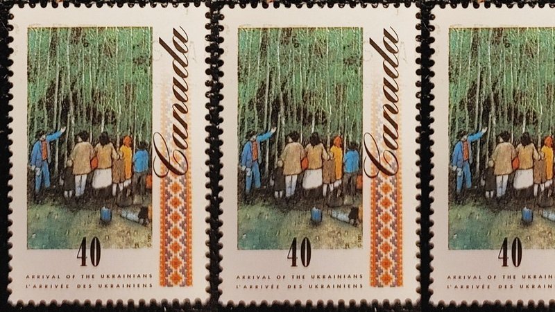 A previous Canada Post depicting the arrival of Ukrainian immigrants in Canada. 