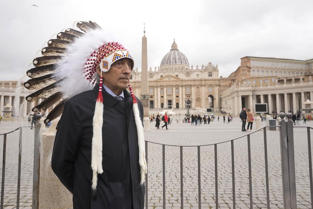 Former national chief of the Assembly of First Nations, Phil Fontaine, stands outside St. Peter's Square at the end of a meeting with Pope Francis at the Vatican, Thursday, March 31, 2022.