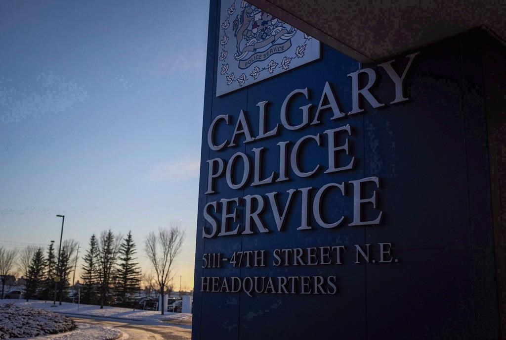 The Calgary Police Service headquarters signage is seen in Calgary on Wednesday, Dec. 7, 2016. A Calgary police officer has been arrested and charged in relation to off-duty conduct.. THE CANADIAN PRESS/Jeff McIntosh.