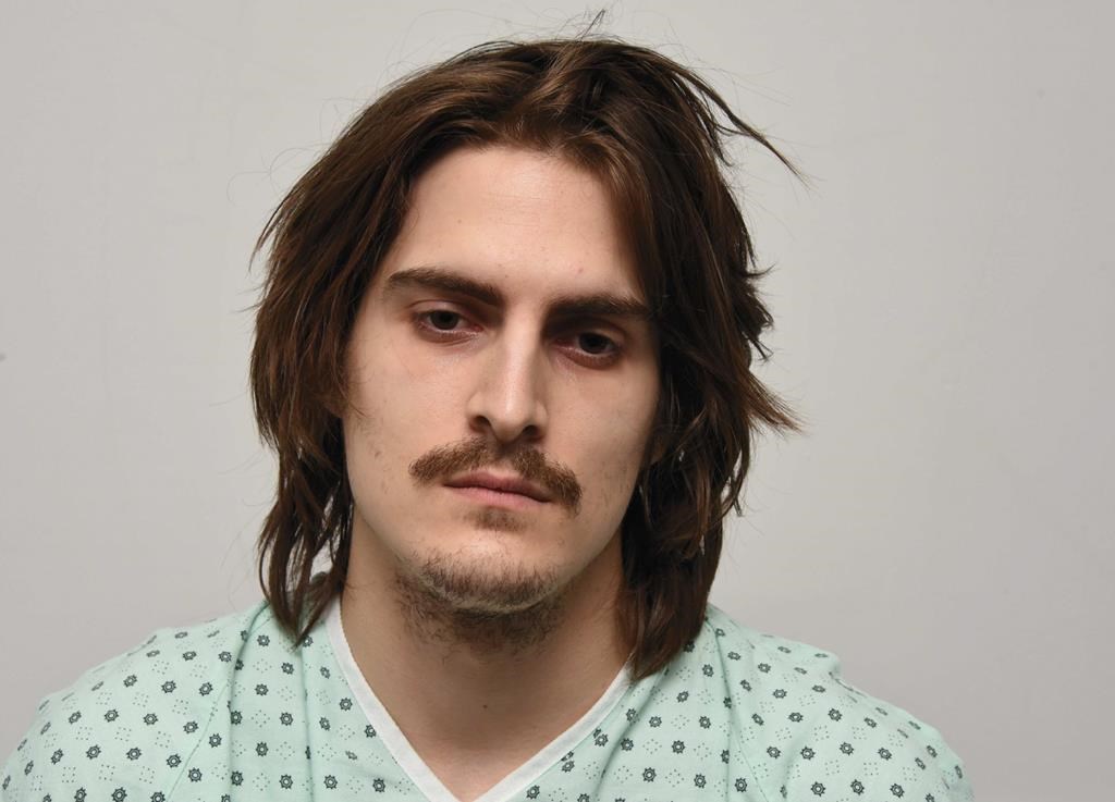 Carl Girouard, 26, is seen in an undated police handout photo received April 14, 2022. 