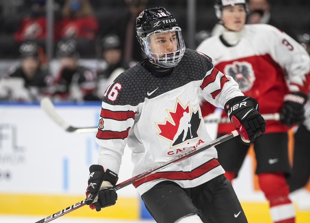 Canada's Connor Bedard (16) skates against Austria during third period IIHF World Junior Hockey Championship action in Edmonton on Tuesday, December 28, 2021.