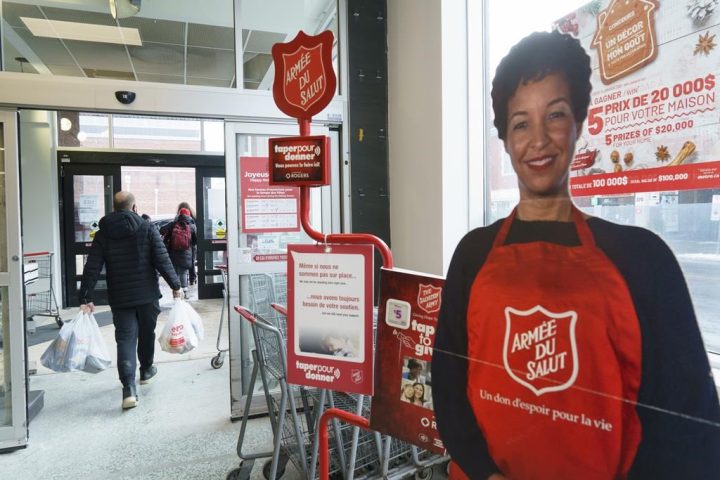 An automated donation stand for the Salvation Army is seen on the way out of a grocery store in Montreal, Monday, Dec. 21, 2020.