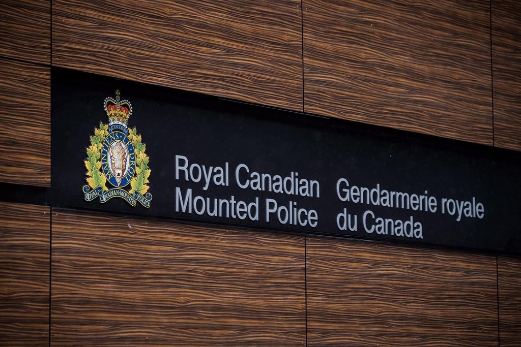 The RCMP logo is seen outside Royal Canadian Mounted Police "E" Division Headquarters, in Surrey, B.C., on April 13, 2018.