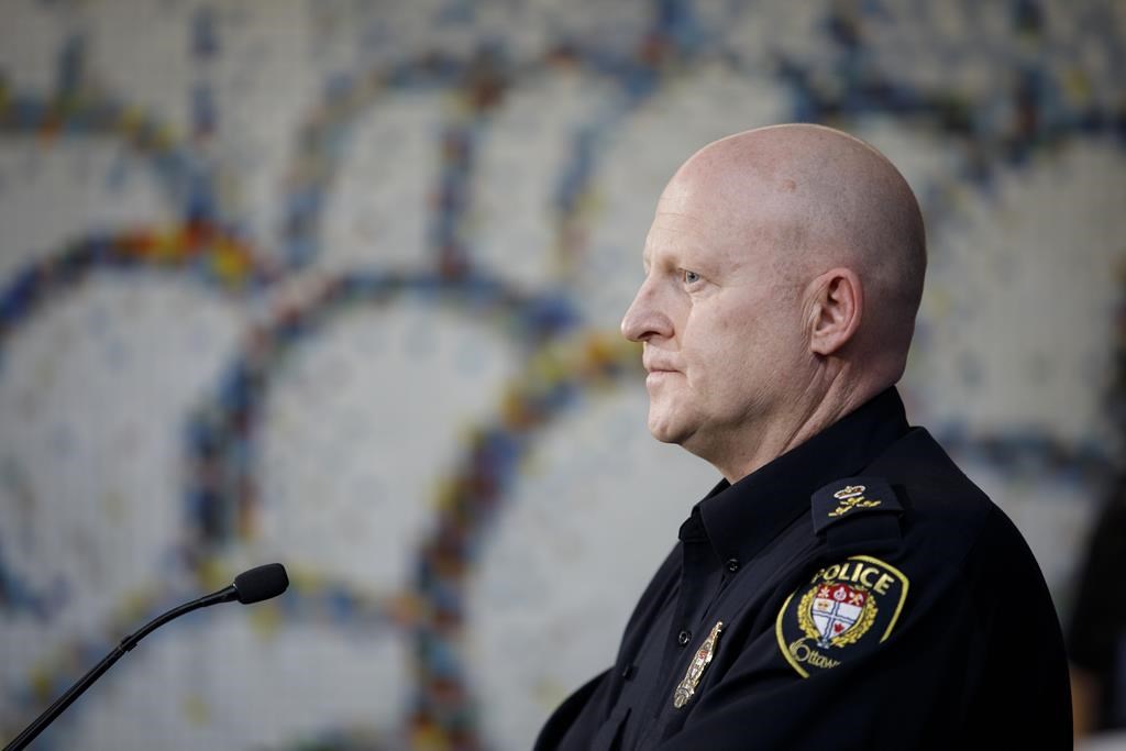 Ottawa interim police chief Steve Bell speaks to reporters during a press conference in Ottawa, Sunday, Feb. 20, 2022. Ottawa police promise a heavy presence in the capital and zero tolerance for hate as a second convoy prepares to descend on the city this weekend, this time involving hundreds of motorcycles instead of trucks.